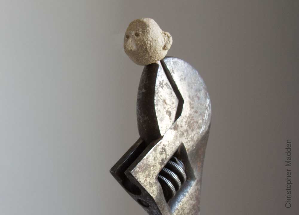 sculpture made from hand tools - spanner with head