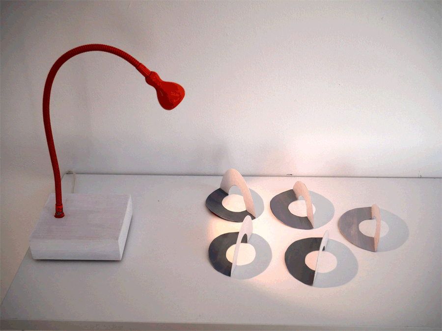 contemporary light art sculpture with cast shadows