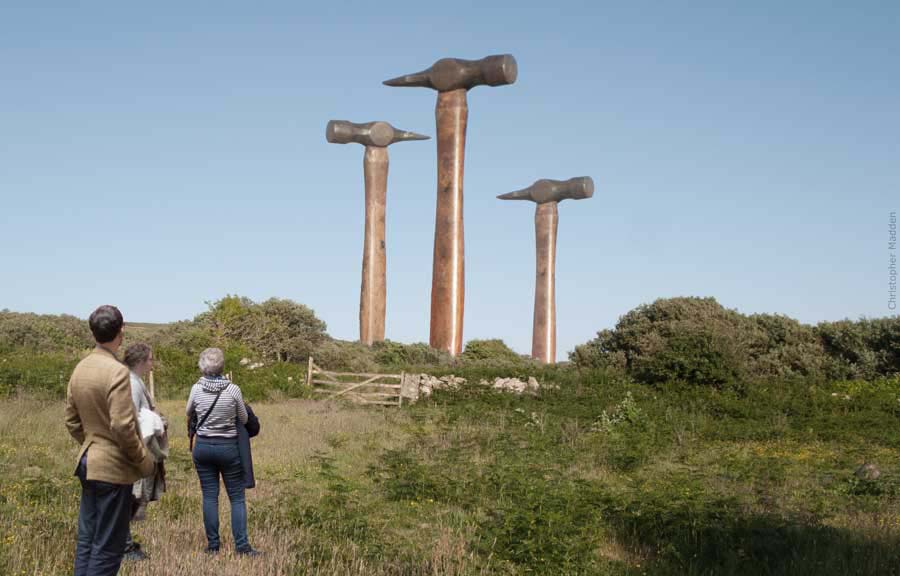 contemporary sculpture land art - giant hammers