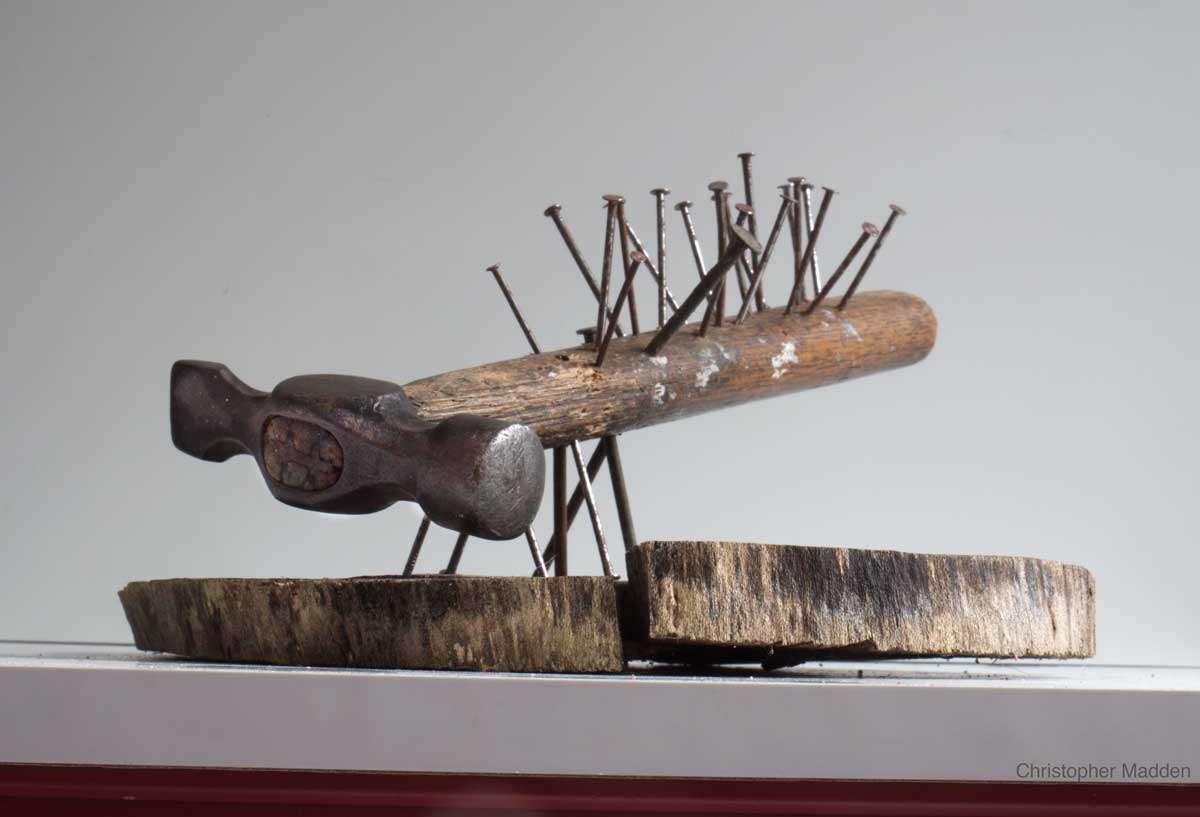 contemporary art about oppression - hammer sculpture