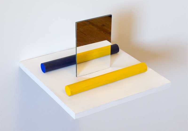 Contemporary art: an optical illusion reflection of colored rods in a mirror