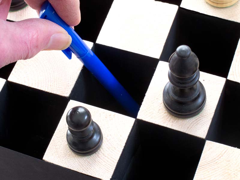 Contemporary art  - black holes in chess board